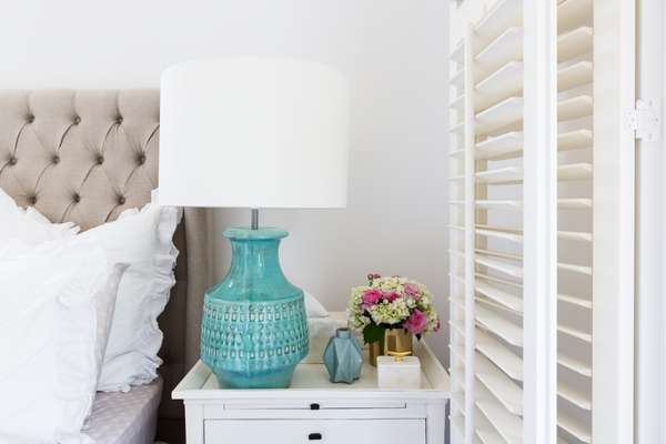 10. Vintage Pieces work well with layered schemes for Bedside Table Design
