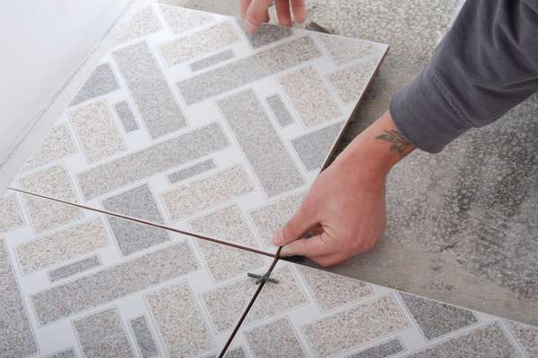 Use encaustic tiles to create patterned designs.